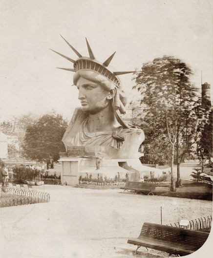 Example of cultural heritage inscripted in the UNESCO World Heritage Convention: Old b/w photo showing the head of Lady Liberty in an exhibition in Paris at the World's Fair in 1878, before it made the travel to NY. The whole statue was an art work by the French sculptor Frédéric Auguste Bartholdi, it was a gift from the French people for the USA. More infos in Wikipedia: Statue of Liberty.
Photo by Albert Fernique - NYDL / Flickr: [Head of the Statue of Liberty on display in a park in Paris..., Public Domain, https://commons.wikimedia.org/w/index.php?curid=22269768