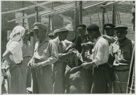 Gyaros Island of Exile - ICRC V-P-HIST-E-05828.JPG 13.05.1948 - Ghioura islland, penitentiary camp nr.4. Distribution of relief items.