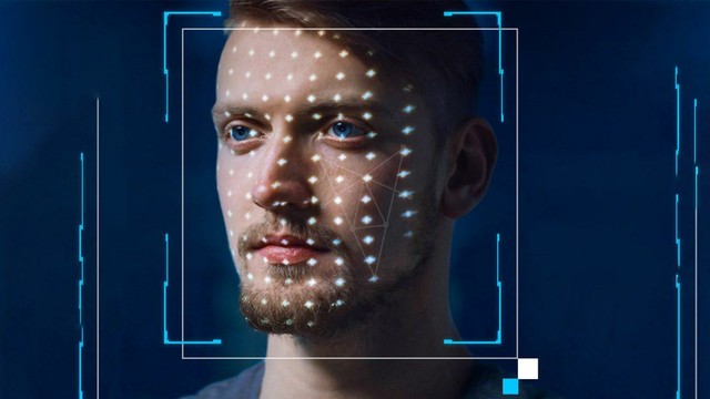 A face of a young man with graphics of digital optical recognition.