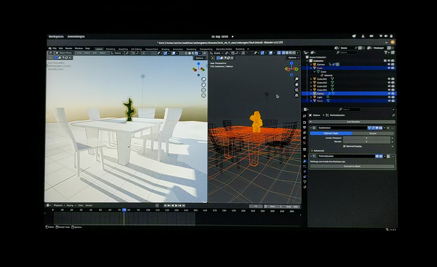 Programmfenster von Blender einer kleinen Szene mit weißem Tisch und Stühlen. Ein kleines Teilfenster zeigt die Szene als Drahtgittermodell.