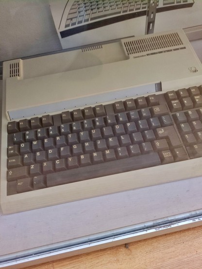 And another MicroBee in a light beige keyboard form factor and black keys.