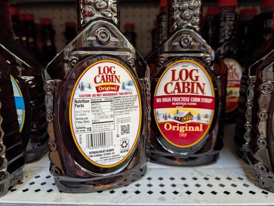 Bottle of fake "maple" syrup advertising "no high fructose corn syrup". The first three ingredients are corn syrup, water, and sugar.