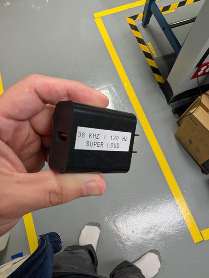USB charger labeled "38 khz / 120 Hz super loud"