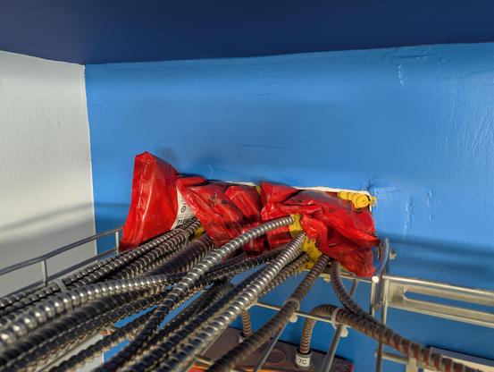 Power tray full of MC with firestopping