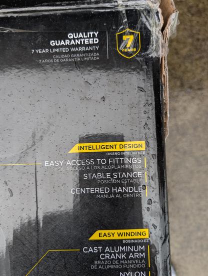 Box from a garden hose reel advertising "intelligent design"