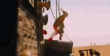 Mad max flame instrument guy on the war rig