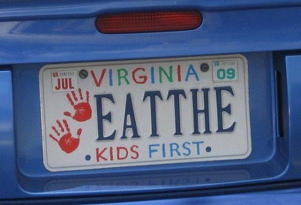 photo of a Virginia vanity license plate. the plate has two small red hand prints on the left side, "VIRGINIA" in alternating colors across the top, and has the slogan "KIDS FIRST" across the bottom.

unfortunately, the registration is "EATTHE" right in the middle, so it reads "EATTHE KIDS FIRST"