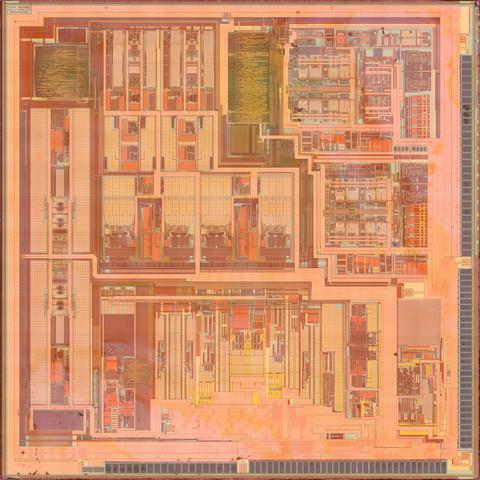 Top metal view of an IC die with lots of analog circuitry I don't understand. Most blocks are replicated twice.