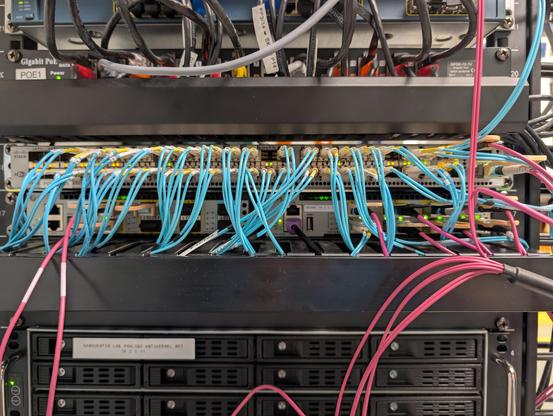 New switch under the old cisco with cables still going to both