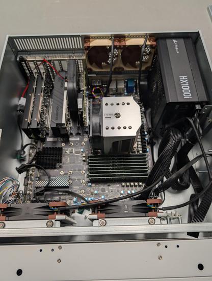 Inside of a 4u server full of fans and gpus