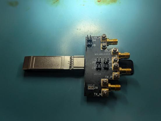Top view of a SFP28 test fixture that fans out to four 2.92mm connectors