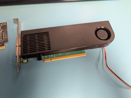 Side view of the fan shroud installed on the NIC