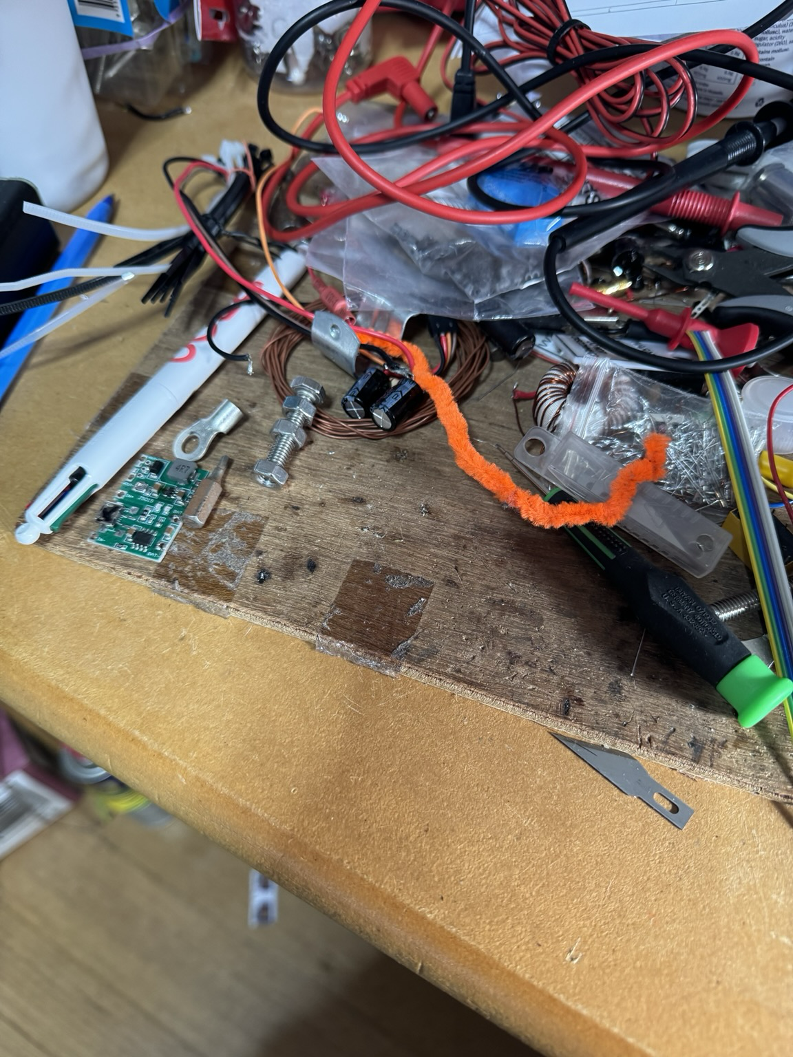 A thin piece of untreated plywood, with a few scorched marks from soldering, and unsoldering