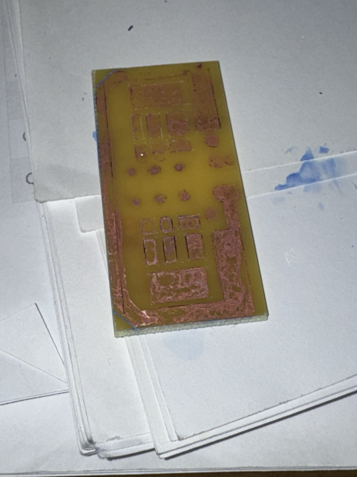 Etched PCB fail. The copper was eroded under the etch-resist ink, but also not enough between the pads