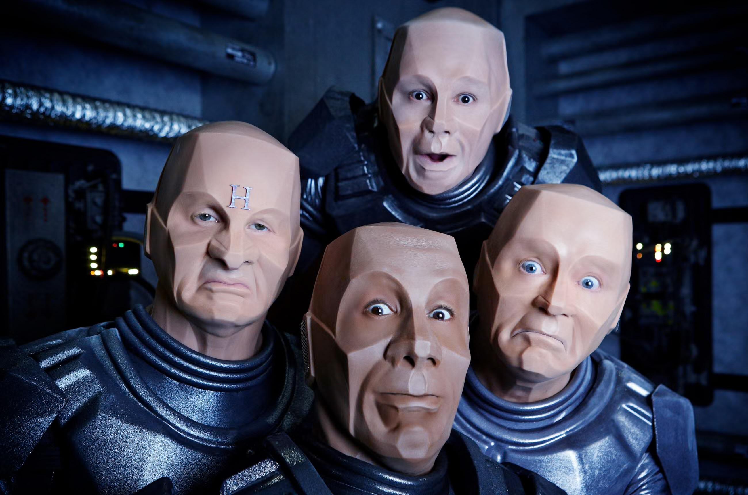 Lister, Cat, Rimmer and Kryten from the BBC tv show Red Dwarf.  All of them Krytenised.