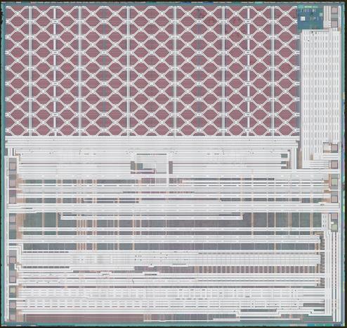 Top aluminum layer of a square flash die. The top ~40% consists of the actual flash array with a strange diagonal power distribution grid over it, the rest looks to be digital logic for the QSPI interface and write control logic.