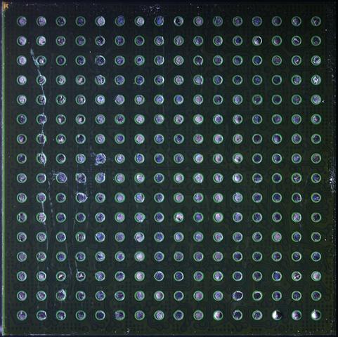 Bottom side of the BGA substrate showing the ball grid and some fanout traces