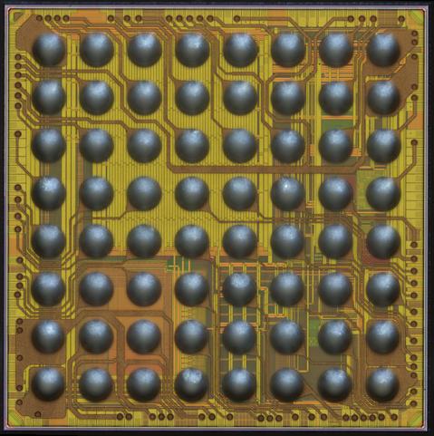8x8 ball BGA made out of a silicon die with solder bumps directly attached to it. A copper redistribution layer can be seen fanning out the signals from the bond pads and connecting to the signal balls.