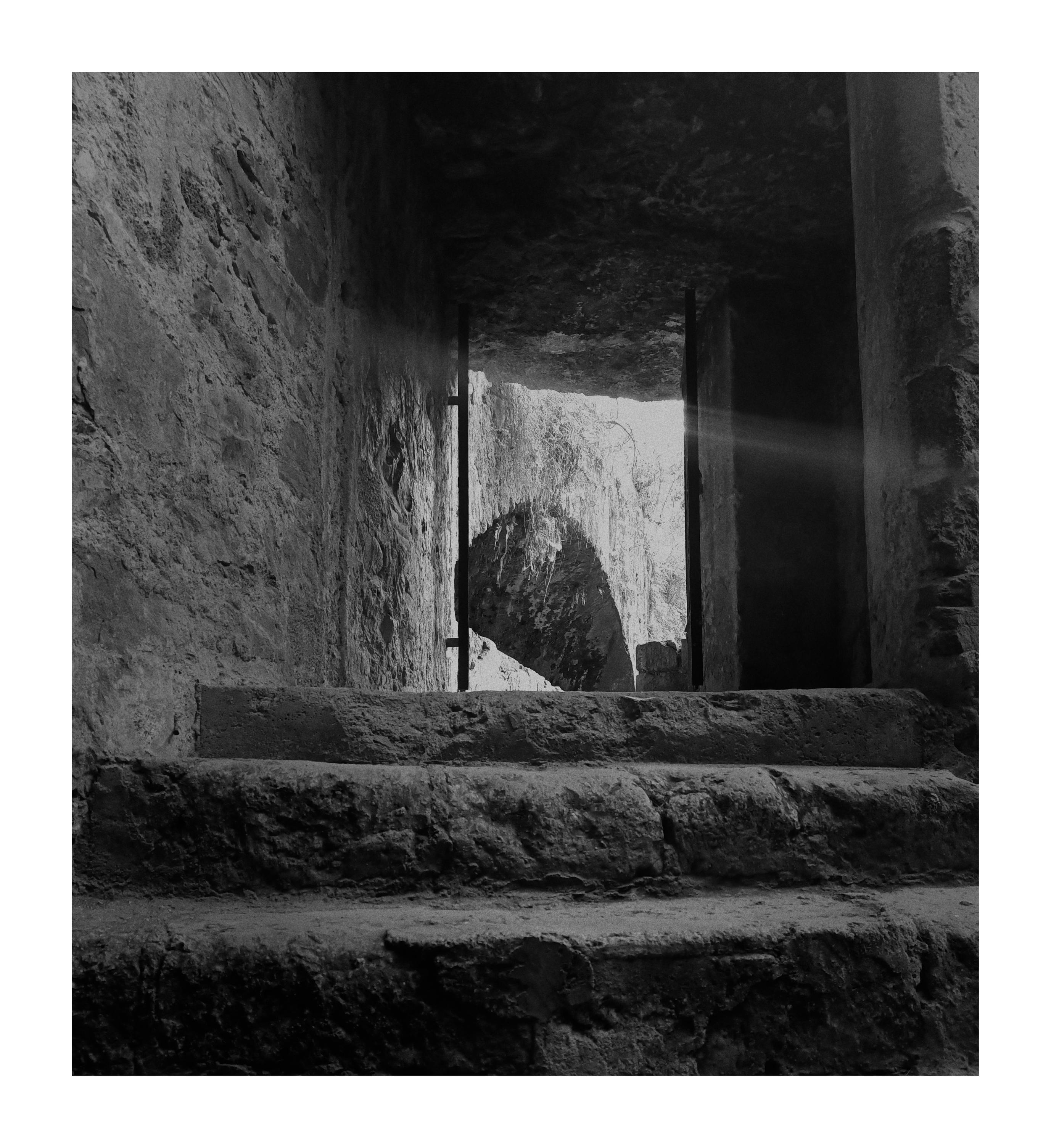 an antique exit made of stones from a former metal foundry...