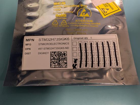 ESD bag with barcode label listing stm32h735igk6 from digikey. A checkbox area on one side allows using a marker to record consumption