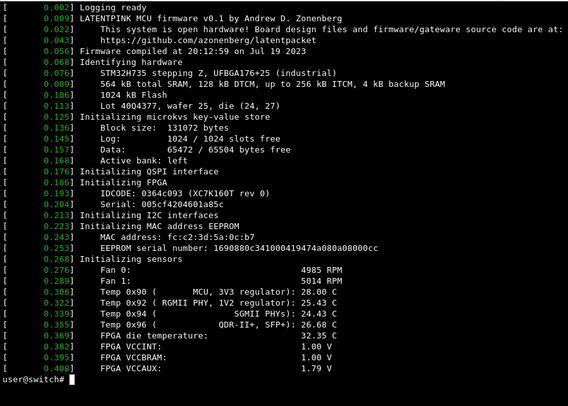 Screenshot of switch boot process including a sensor dump showing two fans at ~5000 RPM, five temperatures in the 24-30C range, and three voltage values all within nominal limits