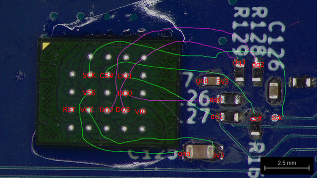 Same photo with proposed connections drawn from ten BGA balls to associated spots on the PCB