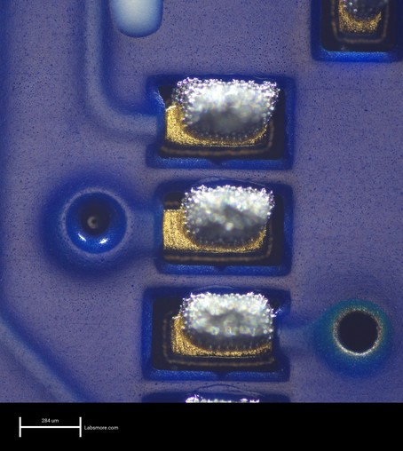 Solder paste deposits on the 0.5mm QFN footprint of the main microcontroller, slightly east and a tiny bit north of perfectly centered