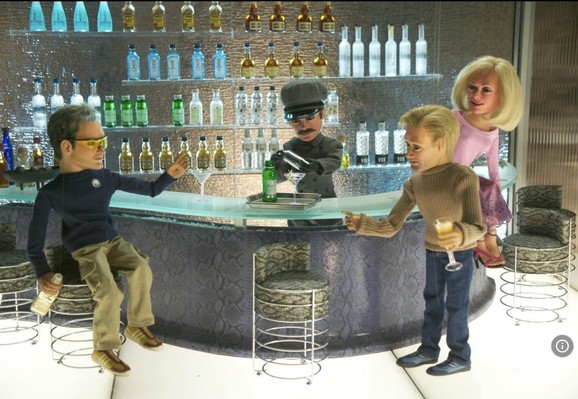 A still from Team America showing the time when the USA Government have drinks sessions after launching drones on Yemen. 

source https://www.smh.com.au/world/north-america/the-first-bombs-will-definitely-drop-full-text-in-us-military-group-chat-scandal-revealed-20250327-p5lmu6.html