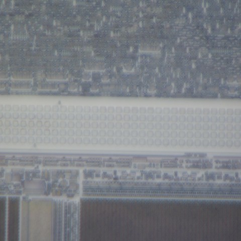 90nm TSMC, ST STM32L431, random logic area at substrate with Olympus 100x objective showing clear contrast in fine features