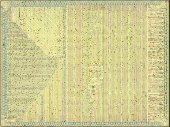 Top metal image of an IC die with power/ground routing running north/south in the east 2/3, east/west in the west 1/3, and diagonal in the northwest corner